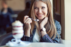 beautiful woman eating an ice cream