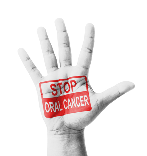 Open hand raised Stop Oral Cancer