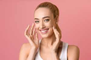 Woman smiling with dental implants in Milwaukee, WI